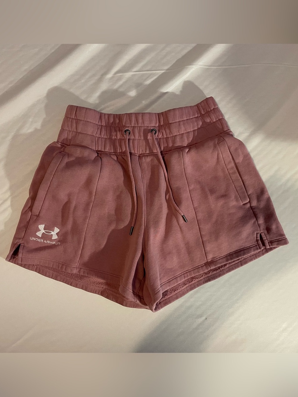 Under Armor pink athletic shorts